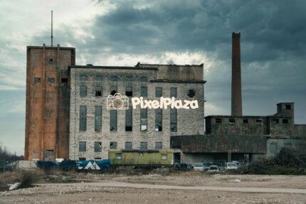 Abandoned Chemical Plant with Broken Windows and Smokestack